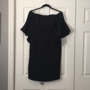 Black off the shoulder dress.